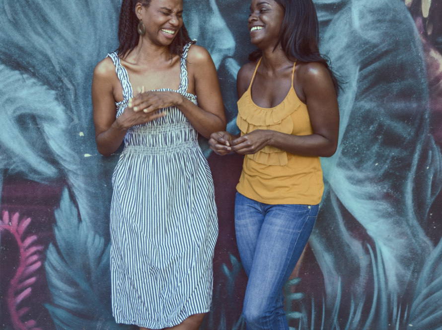 In the image, we can see Sonia and Kay smiling.