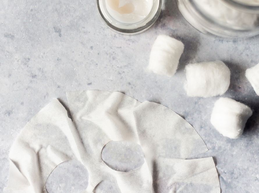 In the image we can see a thin dough like pancakes, moist and with holes that simulate a face.